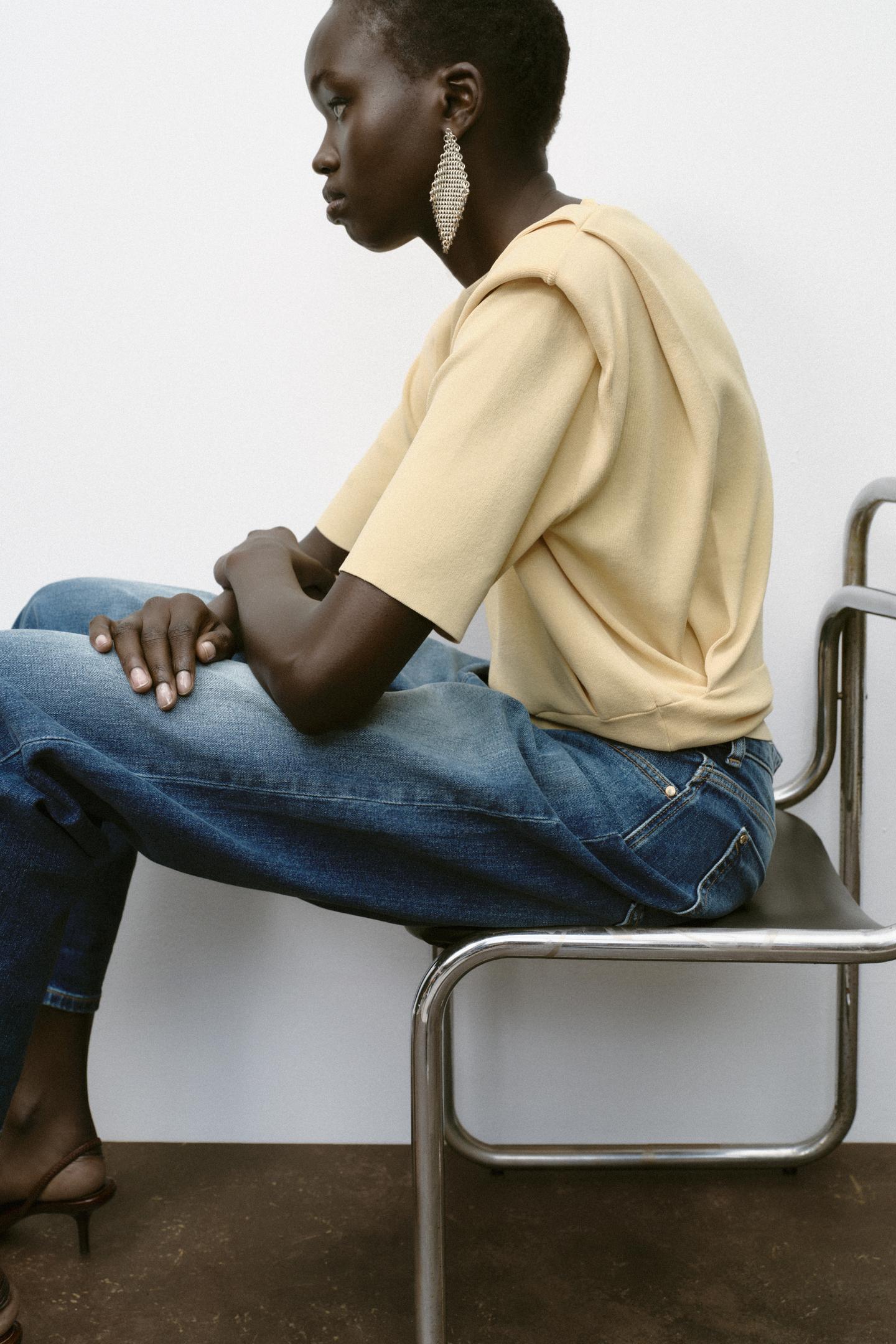 KNIT TOP WITH SHOULDER PADS