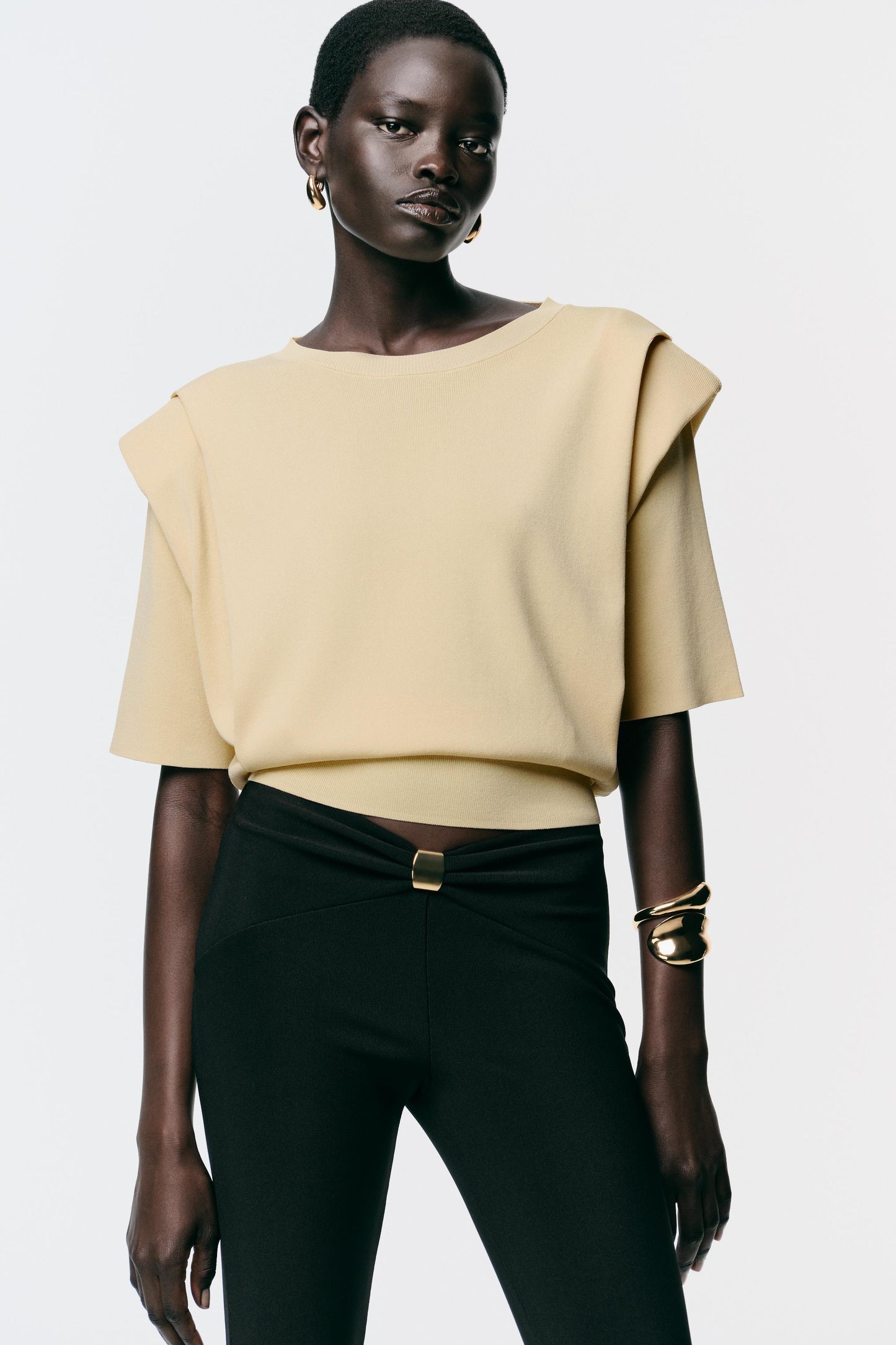 KNIT TOP WITH SHOULDER PADS