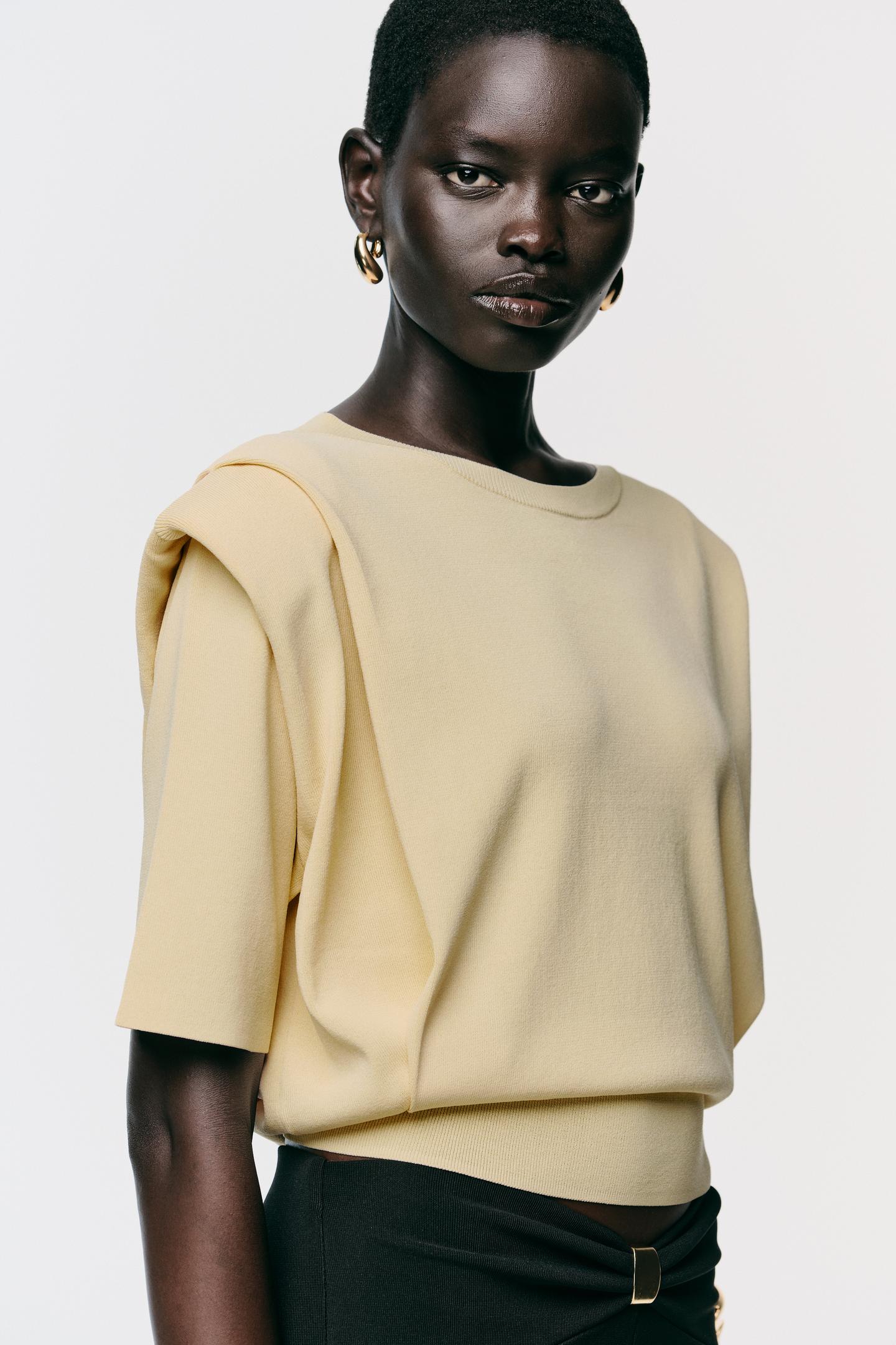 KNIT TOP WITH SHOULDER PADS